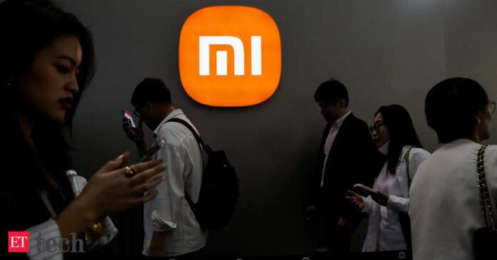 Xiaomi CEO Lei Jun announcing the company's R&D investment